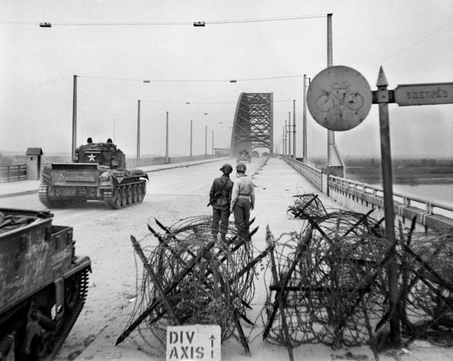 Cromwell tanks of the 2nd Welsh Guards cross Nijmegen bridge, September 21, 1944.