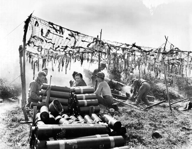 A battery of the 2nd Infantry Division Artillery blasts the German garrison in Brest. The Germans held out for four weeks.