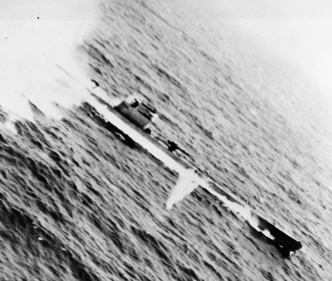 This photo was snapped by a crewman aboard the Consolidated PB4Y-1 Liberator nicknamed Tidewater Tillie as the bomber pressed home its attack against a German U-boat in the Bay of Biscay. The crew dropped depth charges and forced the submarine to the surface before finishing it off. 