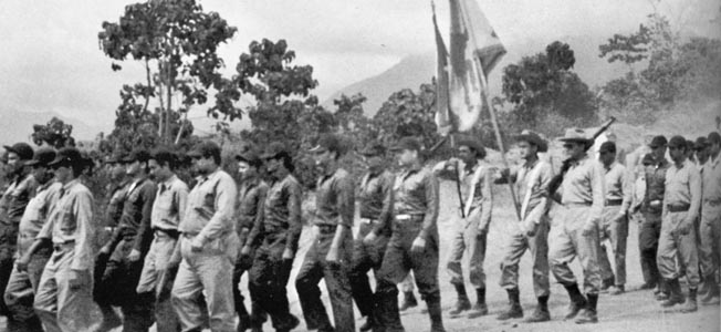 A ragtag group of poorly trained anti-Castro Cubans, covertly supported by the CIA, landed at the Bay of Pigs to overthrow the communist in Cuba.