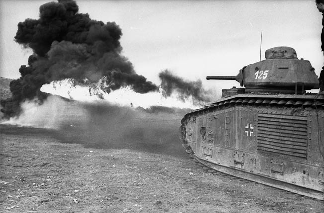 During their successful campaign against France in the spring of 1940, the Germans captured large numbers of French tanks and pressed them into service with the Wehrmacht. Here, a French-made Char B1, converted to a flammpanzer or flamethrower tank, is seen in action in southern Ukraine.