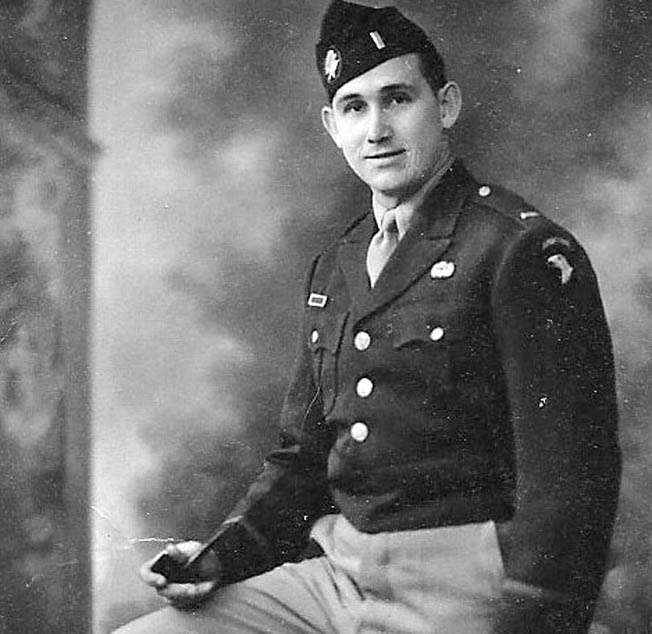 Lieutenant William Parks of the 101st Airborne Division lost his helmet liner as his unit moved out. 