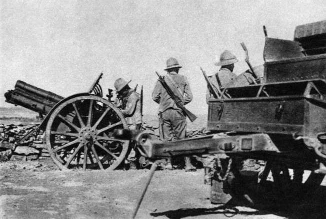 In 1939, at the request of President Roosevelt, Donovan traveled to Africa to report on the Italian-Ethiopian war that was then raging. Here an Italian artillery crew prepares to fire its 65MM gun at native troops.