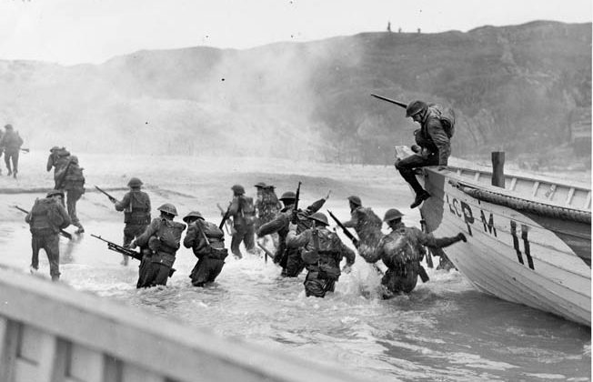 ABOVE: Canadian troops rehearse for Operation Overlord at the Slapton Sands training area in Devon, England. They are disembarking from wooden lifeboats rather than the military landing craft they will come ashore in on D-Day. OPPOSITE: Of all the Allied forces on D-Day, the Canadians made the deepest penetration inland—four miles from Caen. 