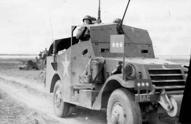 Patton heads to the Tunisian front in his scout car. Craig delivered the vehicle to Patton after driving it and three other needed vehicles across 1,500 miles of North African desert.