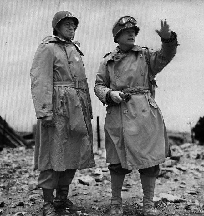 Generals Omar Bradley, left, and Joseph Lawton Collins discuss post-D-Day strategy. 