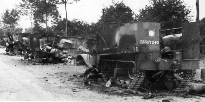 This long line of battered British vehicles is mute testimony to the ferocity of Wittmann’s attack at Villers-Bocage. The vehicles were blown up while parked on a hill leading to Point 213 along the N175 road run- ning northeast from the town.