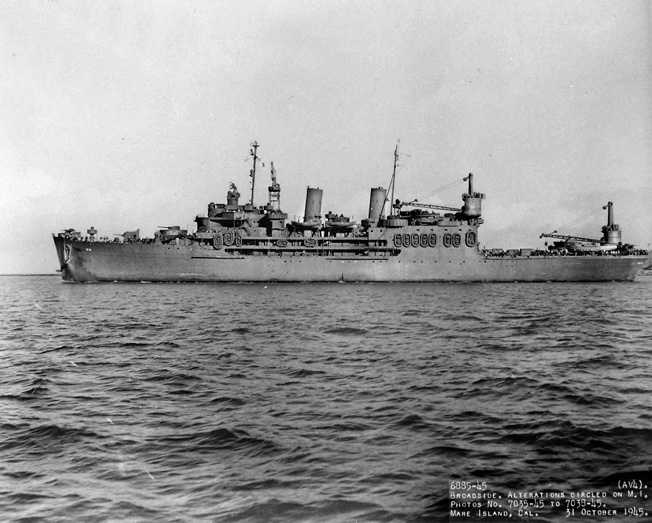 The USS Curtiss, a veteran of World War II in the Pacific, sails off Mare Island, California, site of an extensive naval facility. The ship earned seven battle stars during World War II and went on to serve in the Korean War.