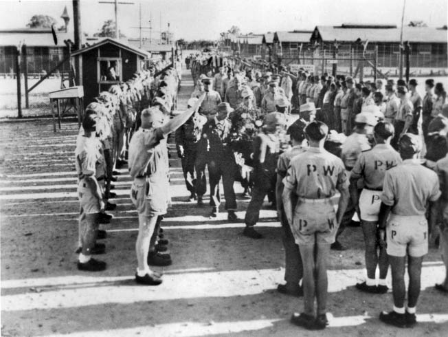 German POWs attend a funeral service for one of their comrades at a camp in Texas; some are giving the Nazi salute. Nazi symbols and salutes were generally tolerated by camp authorities.