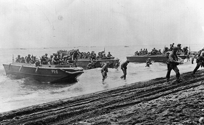 Marines land on Beach Red, Guadalcanal, August 7, 1942, only to find no initial enemy opposition. Most were expecting stiff resistance on the beach.