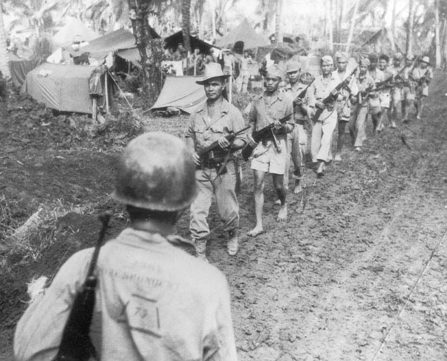 In a guerrilla war on Luzon, Americans and Filipinos fought Japanese occupiers in Philippines before the return of General MacArthur in World War II.