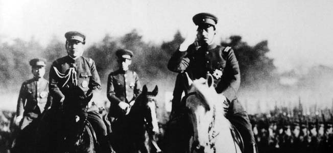 Was Emperor Showa ("Hirohito" as he is typically referred outside Japan) a warmonger, pacifist, or both?