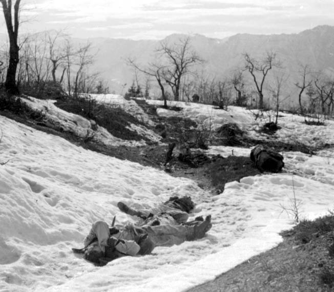 Bodies of 10th Mountain Division soldiers remain where they fell during the attack on Mount Belvedere in Italy’s northern Apennine Mountains.