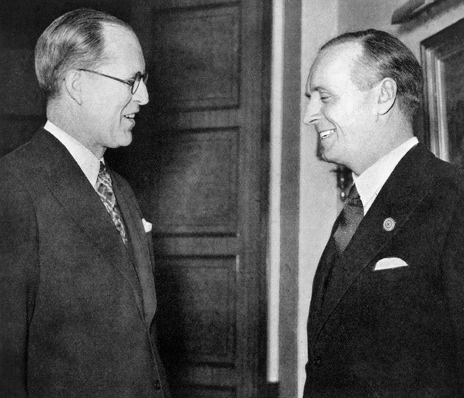 Ambassador Kennedy said that, in case of war between Britain and Germany, the U.S. might remain neutral—words that angered Britain. Here he meets with German Foreign Minister Joachim von Ribbentrop at a London reception in 1938.