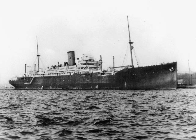 HMS Jervis Bay, shown in 1940 at Dakar, Senegal, was a converted passenger liner with obsolescent armament, but she had an indomitable captain and crew.