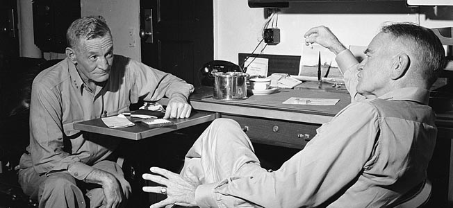 Admiral John S. McCain, left, and Admiral William F. Halsey converse aboard the battleship USS New Jersey in December 1944. 