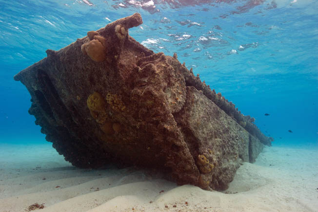 This LVT (A)-4 “Marianas Model” amphibious landing craft lies where it sank off the island of Saipan. The vehicle was capable of traversing coral reefs, delivering men and supplies to embattled beaches in the Pacific.