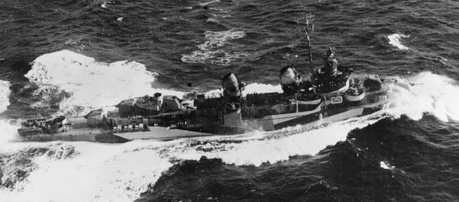 The American destroyer USS Leutze plows through heavy seas. The ship would sustain heavy damage in her brief wartime service and was decommissioned in December 1945.