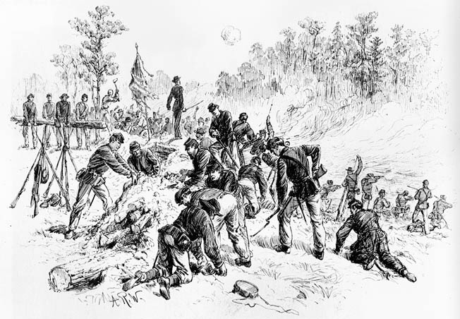 Veteran soldiers in Maj. Gen. Winfield Scott Hancock’s II Corps dig frantically with bayonets, tin plates, and bare hands to throw up shallow breastworks before an expected Confederate countercharge. 