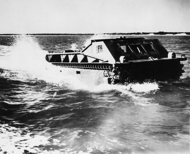 An Amtrak of the U.S. Marine Corps churns toward the shoreline during amphibious exercises at New River, North Carolina, in 1941