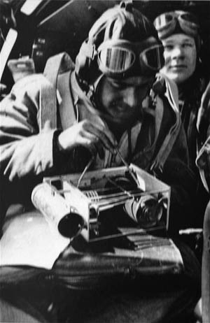 Helmut Rau, left, in the observer seat, taking weather readings in an He-111 in the summer of 1941.