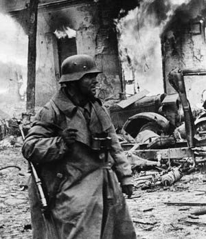 A battle-hardened German panzergrenadier makes his way through the town of Zhytomyr, Ukraine, in December 1943. Around Nikopol, the Wehrmacht and the Red Army fought for control of some of the richest mines in the world.