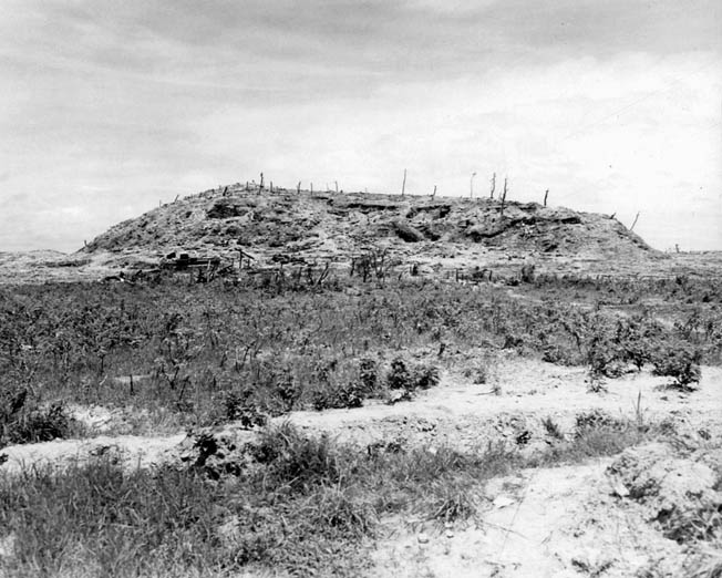 The battered terrain feature known as “Sugar Loaf Hill,” where author and Marine veteran William Manchester said the life expectancy was “about seven seconds.” 