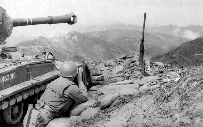An M-46 Patton tank strengthens the American line atop Pork Chop Hill. After five days of hard fighting, the Americans pulled out quietly so that the Chinese would not take advantage of their withdrawal to attack them while they were most vulnerable.