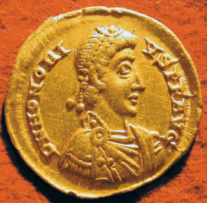 A Roman coin bears the image of Emperor Honorius.