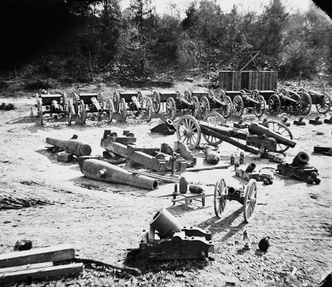This famous photo shows mortars and other large artillery pieces on the beach below the town.