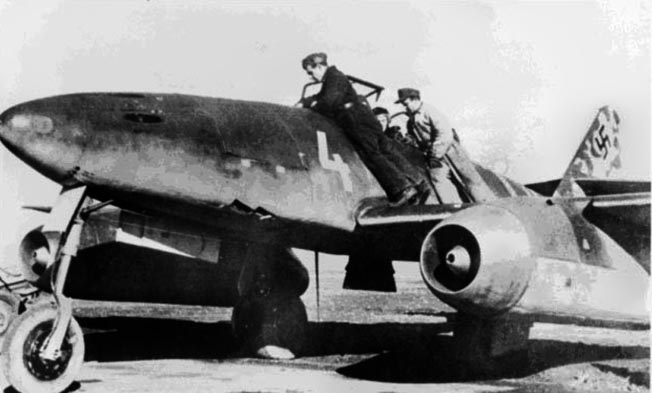 An Me-262 being prepped by its ground crew. The jet fighter had a top speed of 540 miles per hour and took great skill to fly.