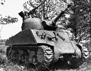 The 105mm-armed M4A3 Sherman tank, known as the M4A3 105 HVSS, was used for infantry and assault support. Miller found the 105mm shells heavy as he passed them to the gunner. 