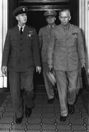 The U.S. Chiefs of Staff, Admiral King, General Arnold, and General Marshall, leave the White House on June 6, 1944, after briefing the president on D-Day. 