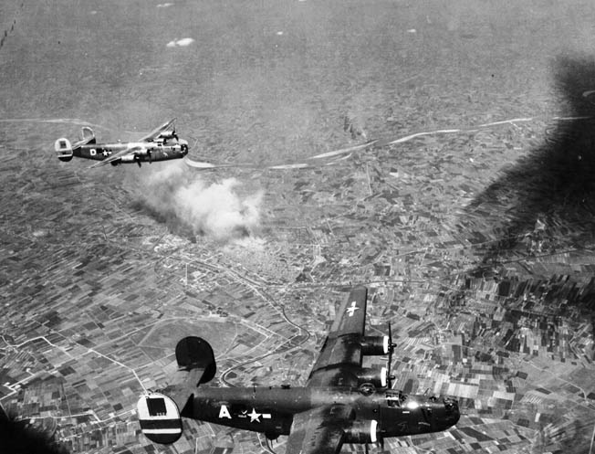 B-24s of the Fifteenth Air Force on a bombing mission over Italy, June 1944. More than 18,000 B-24s were produced during the war.