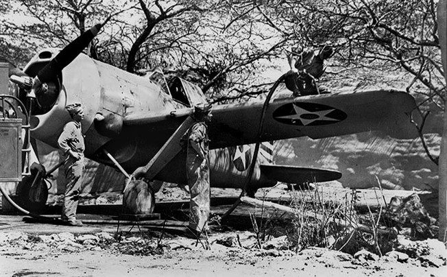 Already obsolescent at the outbreak of war, this Marine Brewster F2A-3 Buffalo is shown during refueling at Ewa Field, Oahu, just weeks before the Battle of Midway. 