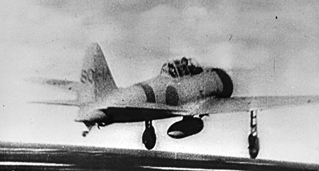 Another still taken from a Japanese newsreel showing a Mitsubishi/Nakajima A6M Zero taking off from an unidentified aircraft carrier.