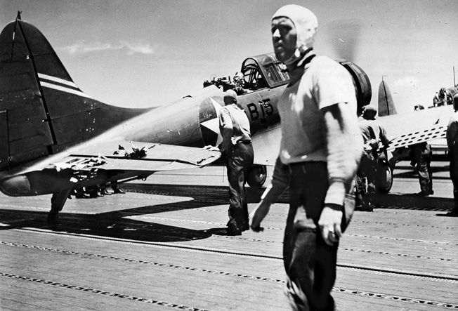 Damaged and low on fuel, a Douglas SBD-3 Dauntless scout bomber from USS Enterprise lands on Yorktown’s flight deck. It was lost when the carrier went down on June 7.