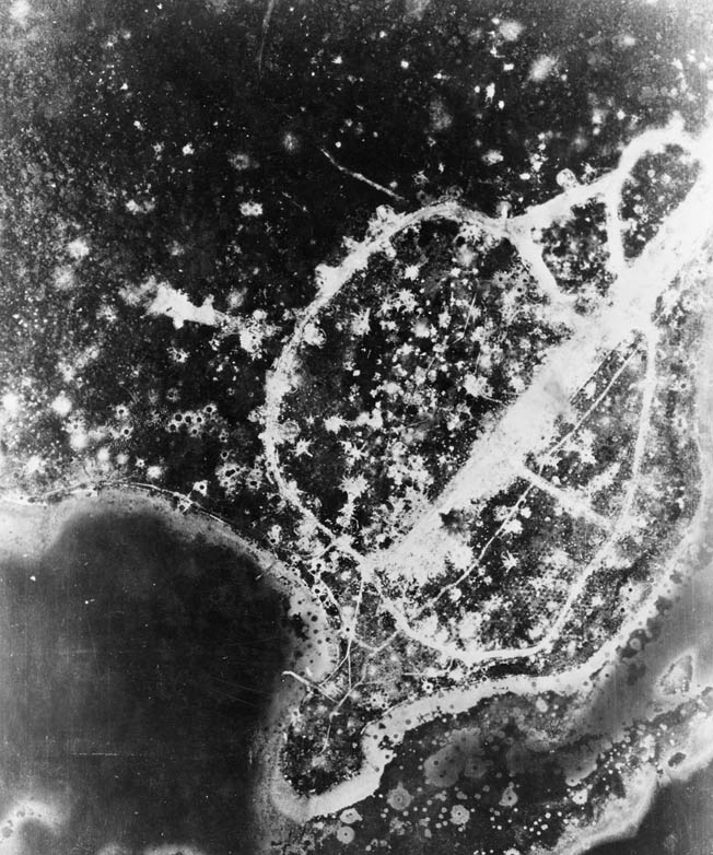 Bombs explode on Munda airfield. The Japanese quickly repaired the damage and put the airfield back into operation until the island was seized by American XIV Corps soldiers in August 1943. 