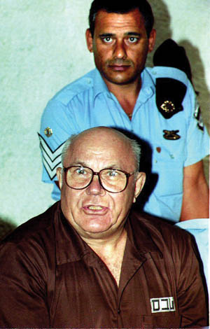 Convicted Nazi war criminal John Demjanjuk, aka “Ivan the Terrible,” listens to the Israeli Supreme Court read his aquittal in 1993, more than five years after he was sentenced to hang.