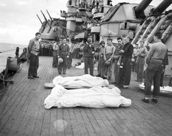 A solemn burial at sea aboard Nevada for casualties from LCI 441 who were killed during the Iwo Jima operation.