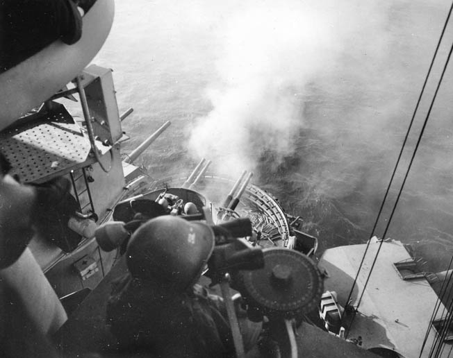 One of Nevada’s 40mm quad “pom-pom” gun mounts opens up on Japanese positions at Iwo Jima, February 17, 1945.