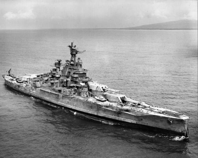 Although charred and radioactive from being subjected to an atomic test blast at Bikini Atoll in 1946, the Nevada remains proudly defiant. She was later sunk by torpedoes in 1948.