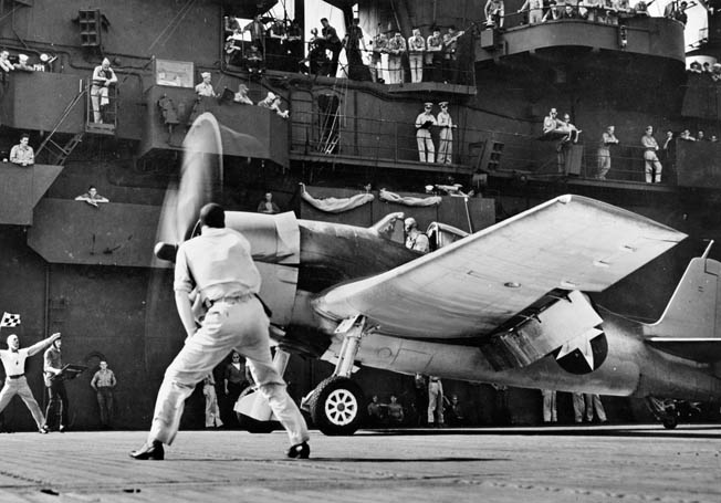 A Navy Grumman F6F Hellcat takes off from a carrier. When O’Hare returned to duty in June 1942, he was made commander of his old squadron, VF-3. In July 1943 his squadron was reconstituted as VF-6 and received Hellcats.