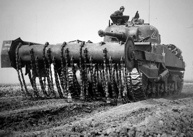 An M4 Sherman “Flail” or “Crab” tank fitted with a rotating drum and chains that pounded the ground ahead of the vehicle to detonate land mines.