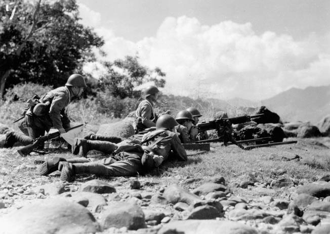 A Japanese machine-gun crew fires at Chinese positions during action on the Asian continent. Japanese expansion in the 1930s began with aggression against China.