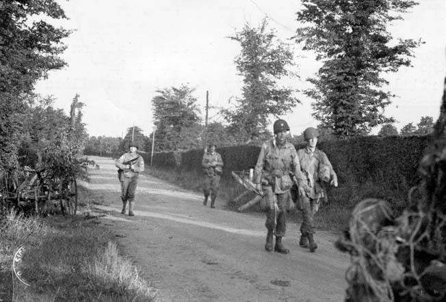 Four members of the 82nd enter the French village of Sainte-Mère-Église after their harrowing drop. 