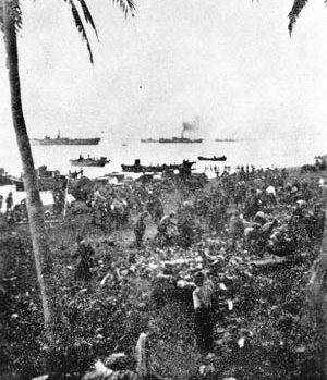 Invasion forces of General Masaharu Homma come ashore against scant opposition in Lingayen Gulf, December 1941.