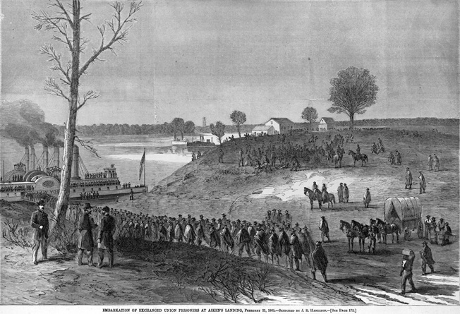 Exchanged Union prisoners walk to the steamboat New York at Aiken’s Landing, S.C., in February 1865.