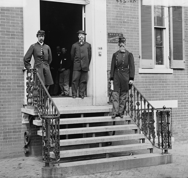 Tightwad Union Commissary General William Hoffman, right, with his staff. 
