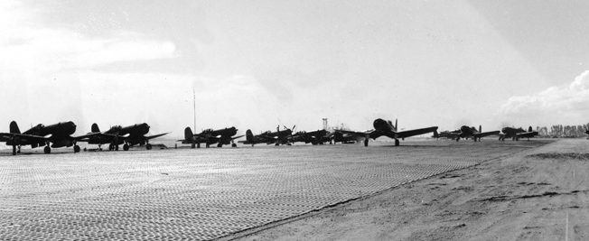 A squadron of Corsairs prepares to take off from an unidentified island airfield. Foss’s unit was one of 145 Marine squadrons that took part in the Pacific campaign. 